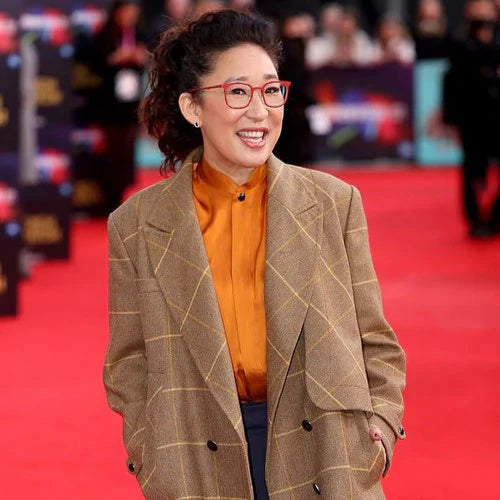 sandra oh orange dress Sandra Oh Picks Orange for Turning Red - Go Fug Yourself
