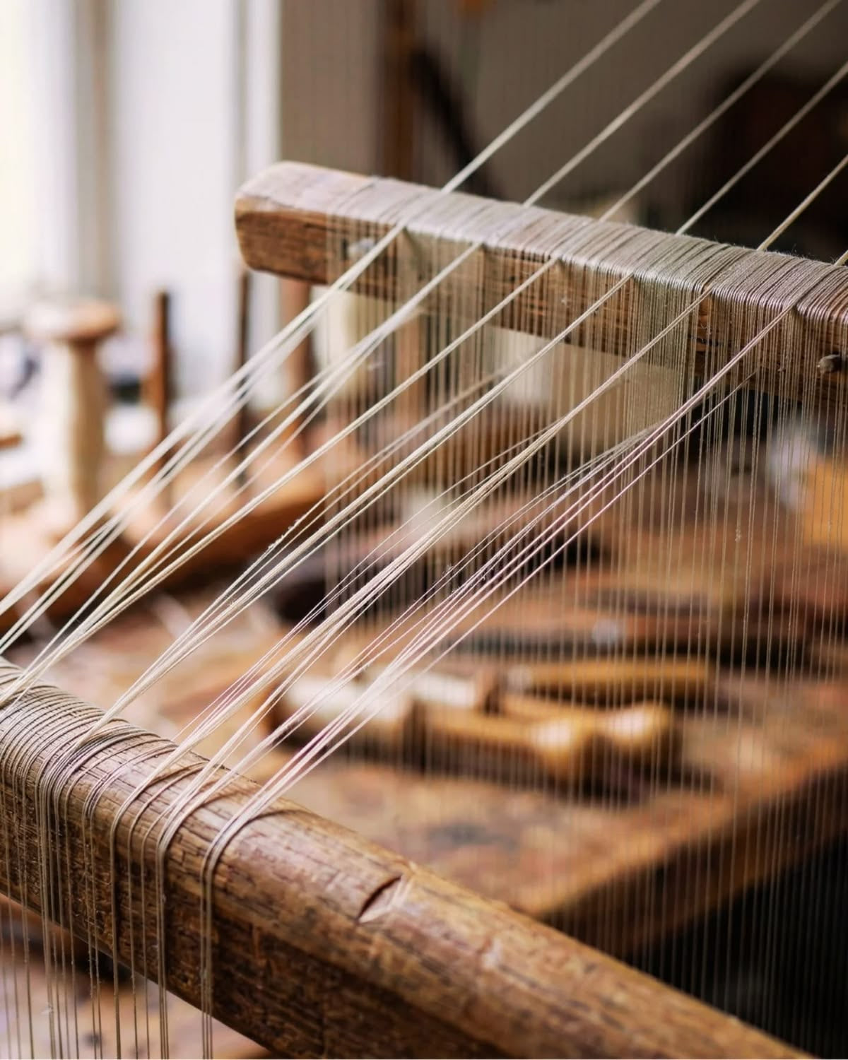 Hands working silk during construction
